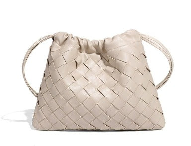 Woven Whisper™ Pouch Bag – Minimalist Elegance with Modern Versatility