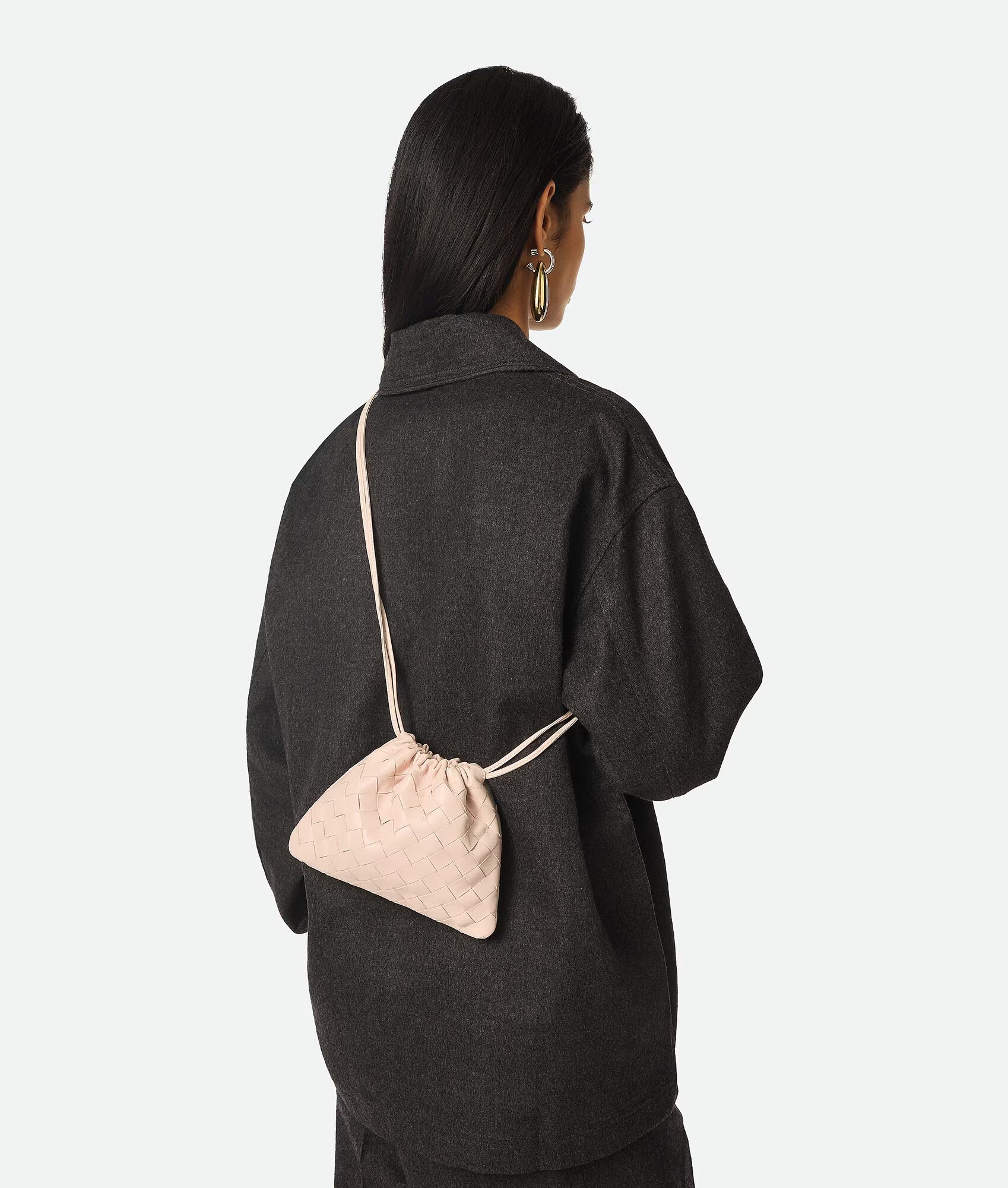 Woven Whisper™ Pouch Bag – Minimalist Elegance with Modern Versatility