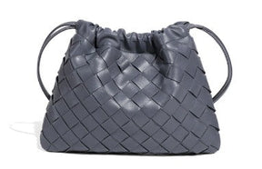 Woven Whisper™ Pouch Bag – Minimalist Elegance with Modern Versatility